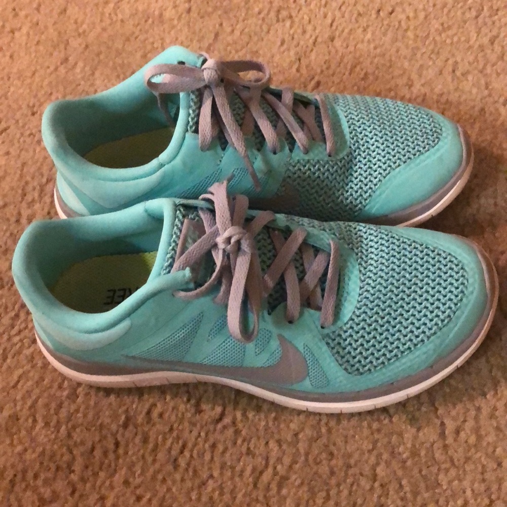 Tiffany blue women’s Nike free runs
